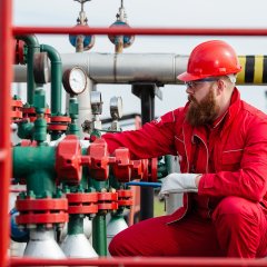 Technician in oil and gas refinery. Worker in Oil Refinery.